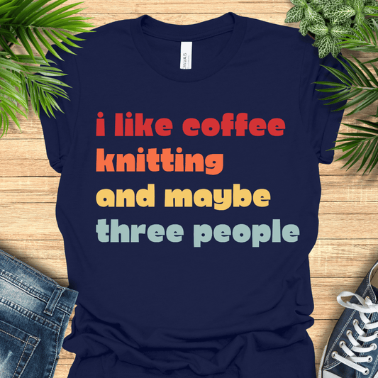 Funny t-shirt for knitters with the text 'I like coffee, knitting and maybe three people'.